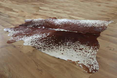 Dark Caramel Tan and Cream Speckled Cowhide Rug